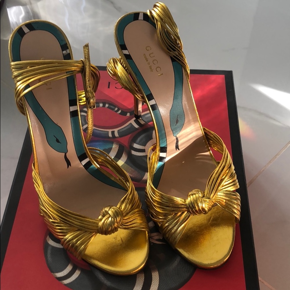 Gold metallic heels Gucci
